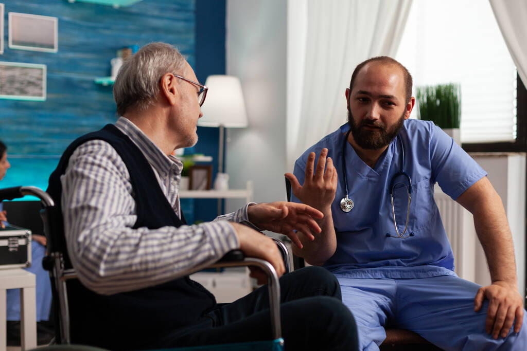 nurse giving recommendations for recovery to senior patient